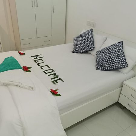 Palm Gate Maldives Hotel Тулусдоо Екстериор снимка